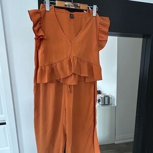 SHEIN Orange Ruffled Peplum Jumpsuit